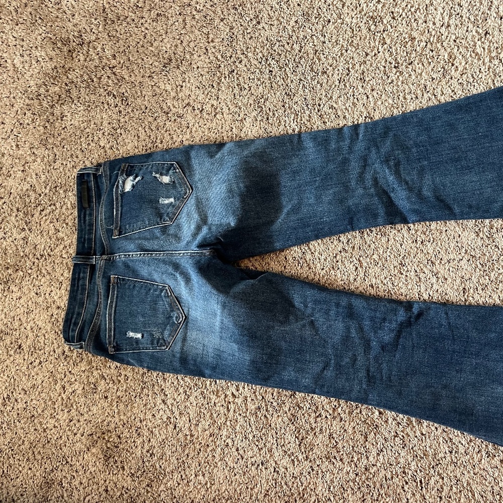 Risen raw hem flare jean